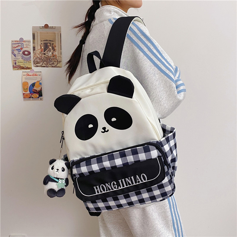 New checkered versatile casual girl backpack, cute cartoon panda schoolbag, girls' primary and junior high school students' backpack full figure