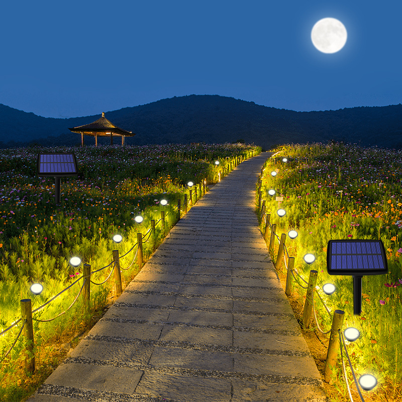 Simple arrangement of outdoor European-style home garden lawn with ABS one-to-ten guiding warm light solar garden lamps full figure