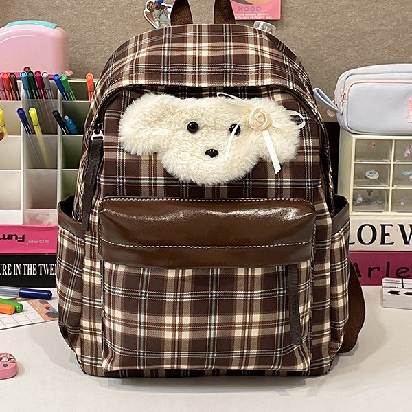 The new cute puppy backpack features a large capacity with a fashionable checkered pattern, a school-style and adorable backpack for young girls, and a student schoolbag details Picture