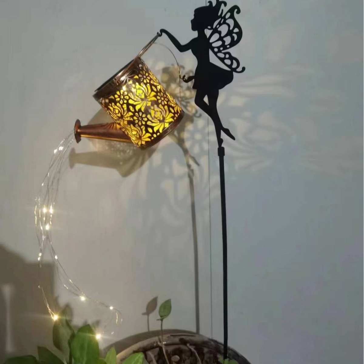 Cross-border solar garden angel water bottle lamp, outdoor display item, ground socket lamp, landscape lamp, ironwork hanging item lamp, lawn lamp Application Scenario