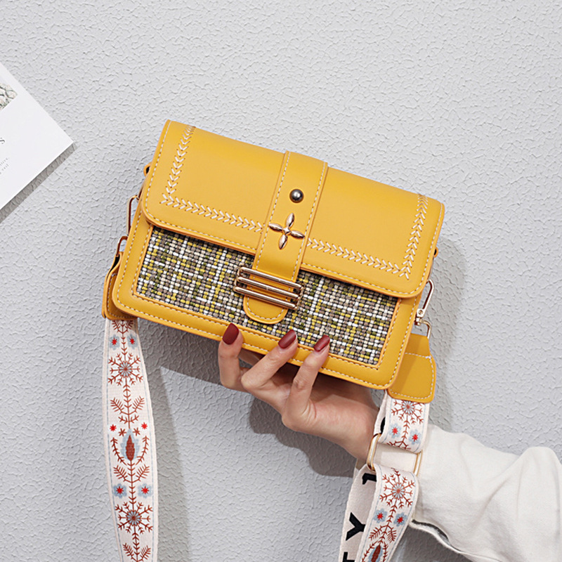 The new Spring/Summer 2022 small square crossbody bag by Bag Girl is fashionable and versatile. It features a checkered pattern and is a trendy Instagram student single-shoulder bag full figure