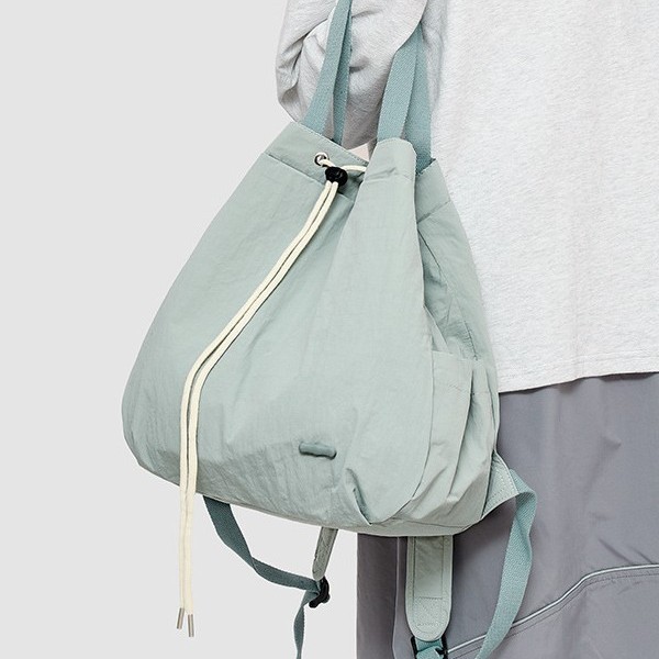 A new and fashionable Korean-style women's niche drawstring backpack with a large capacity and lightweight nylon commuting hand bag Specification drawing