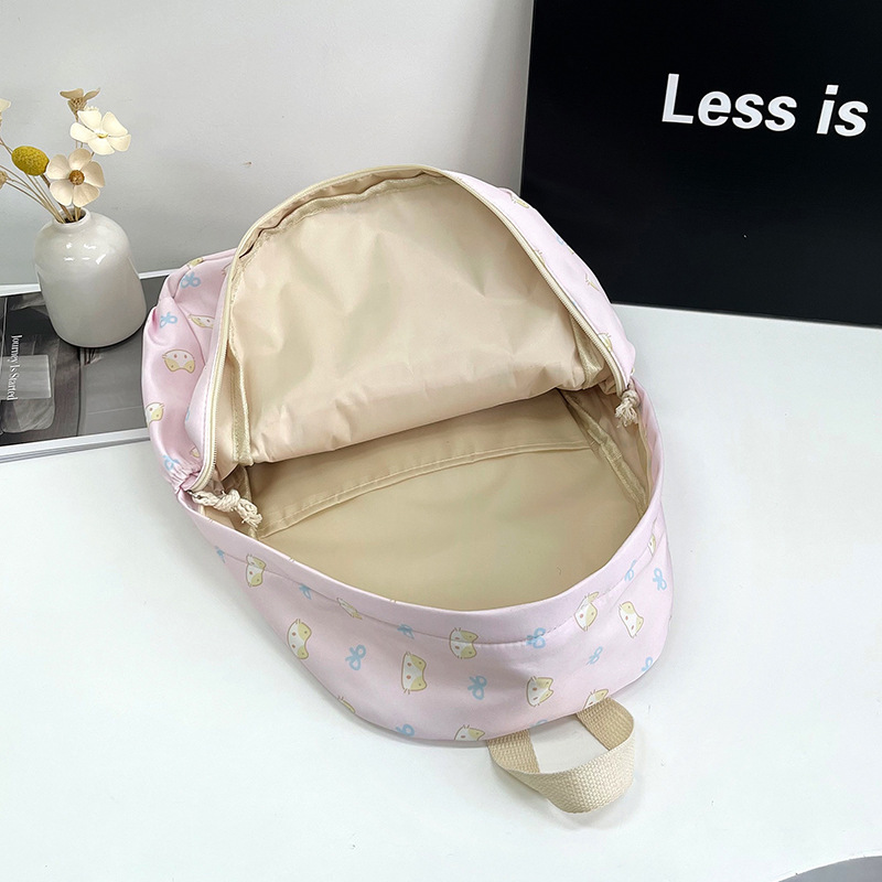 Cartoonish and cute ins fresh backpack, simple printed casual student schoolbag, large-capacity travel trendy backpack Application Scenario