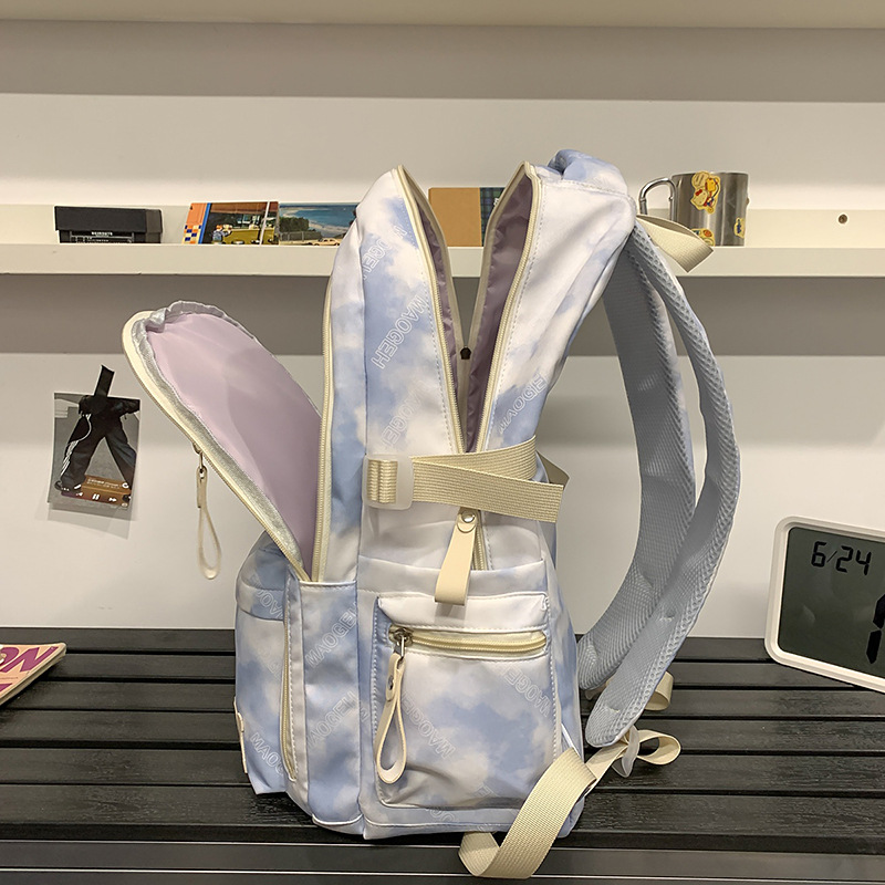 A new Japanese-style ins tie-dyed schoolbag with a large capacity for students and a fresh backpack for Harajuku junior high school students Application Scenario