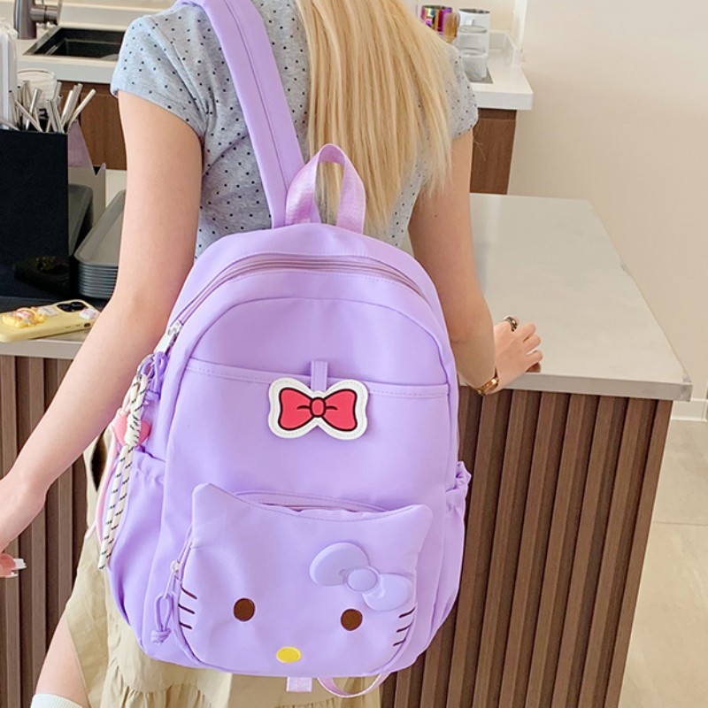 The new cute cartoon schoolbag is simple and casual. It is a backpack for junior high school, senior high school and college students with a large capacity for travel full figure