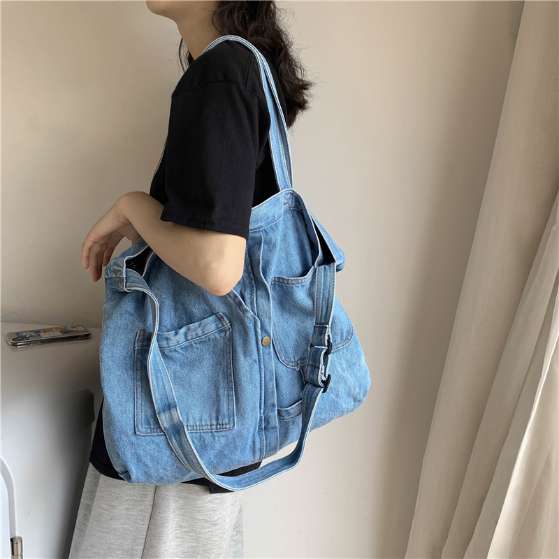 Wholesale washed denim canvas bags, women's retro hand-held shopping bags, large-capacity casual school-style single-shoulder crossbody bags details Picture