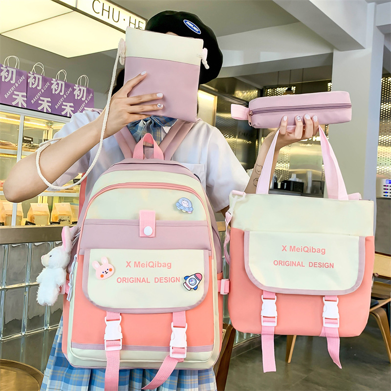 New backpack for girls, a large-capacity, lightweight and casual backpack for primary and junior high school students. Four-piece set of buns and mother bags, trendy full figure
