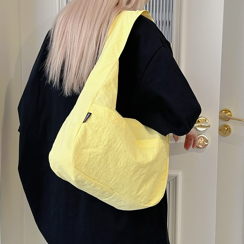New solid-color versatile single-shoulder bag, simple and elegant college student dumpling bag, casual and durable, high appearance level, ins underarm bag for women details Picture