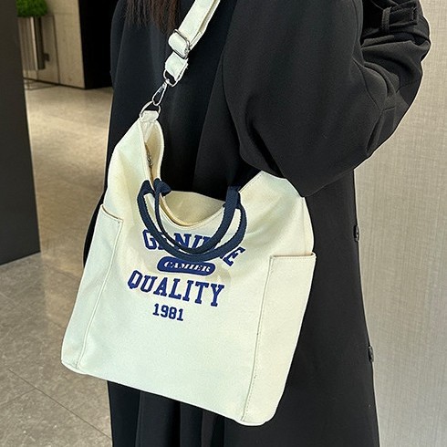 Canvas backpack bag, cotton letter casual hand-held bag, printed cosmetics and accessories, new cotton canvas bag Specification drawing