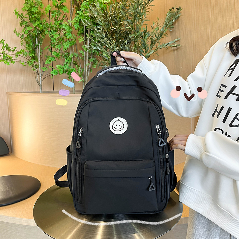 New printed backpack for junior and senior high school students, a simple and large-capacity Korean version backpack for girls, a lightweight and casual travel bag details Picture