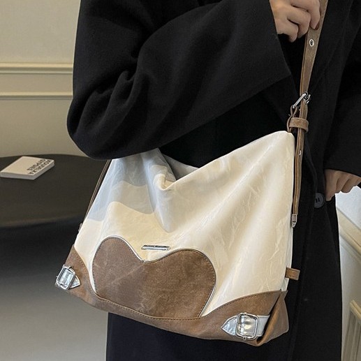 The 2024 new leather fleece casual underarm bag is a large-capacity, multi-functional single-shoulder crossbody bag with a two-tone color scheme details Picture
