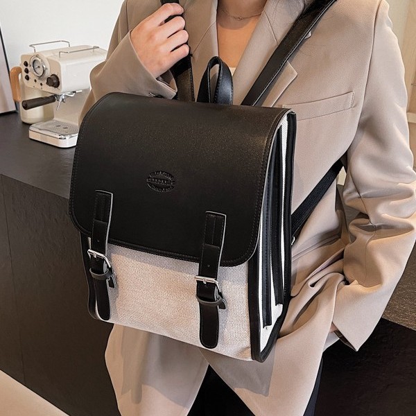 A fashionable autumn and winter new large-capacity backpack with contrasting colors, a versatile student schoolbag, and a retro color-blocked commuting backpack Application Scenario