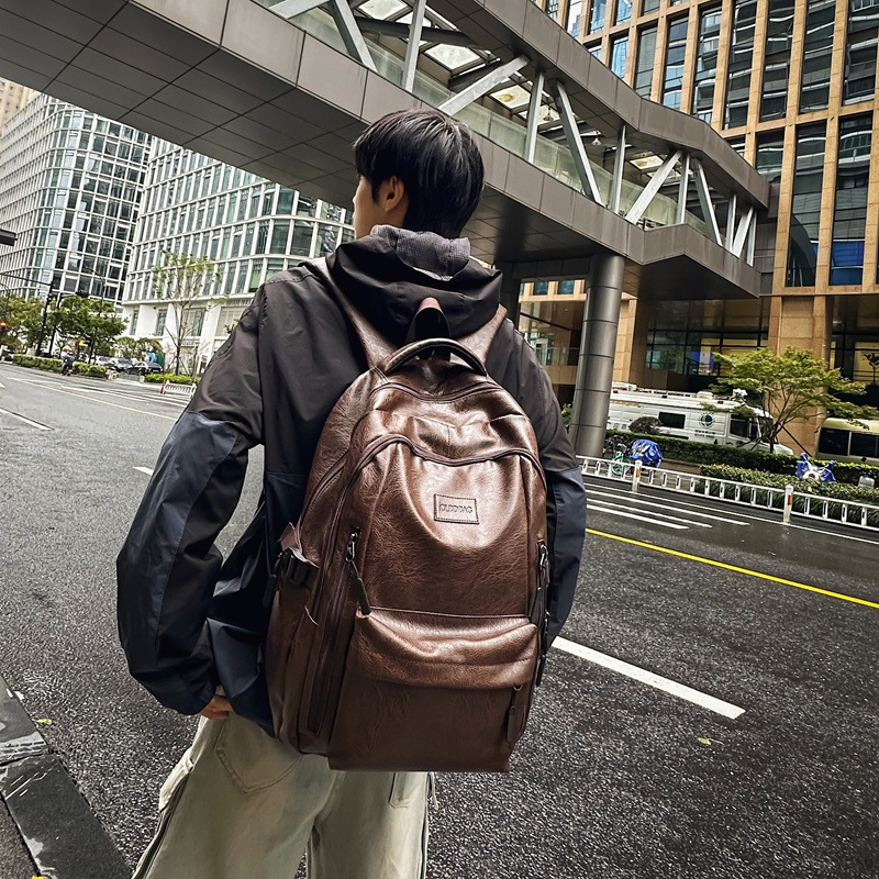Wholesale junior high school student schoolbags, men's fashionable and trendy soft leather backpacks, men's high-end and stylish middle school student backpacks details Picture