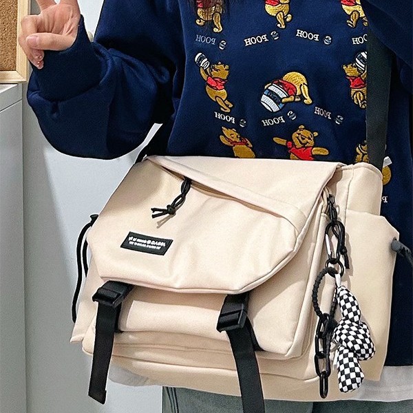 Women's crossbody bag, functional workwear, Japanese casual trendy brand, large-capacity backpack, men's bag, sporty and simple single-shoulder bag Application Scenario