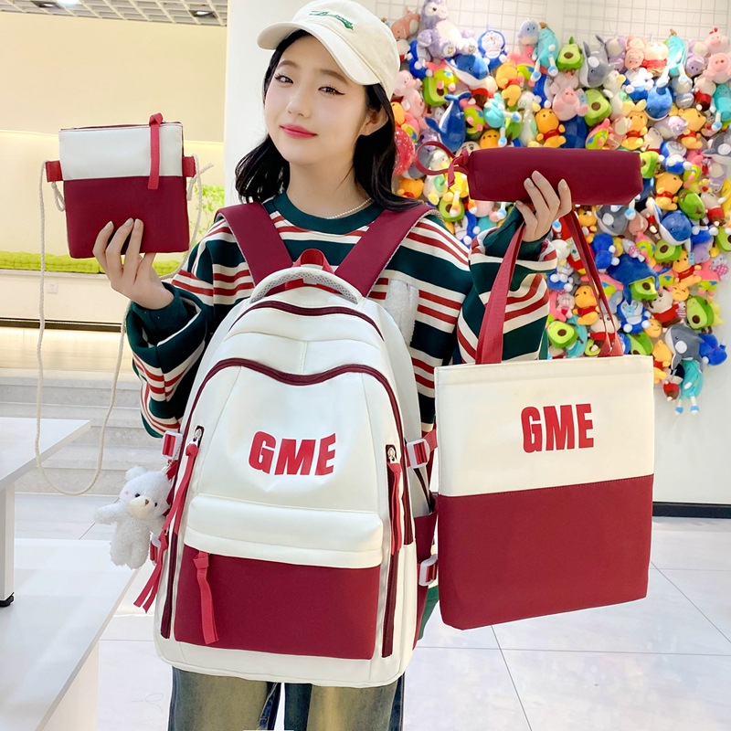 The new trendy backpack is fashionable and has a high level of appearance. It is a color-matched junior high school student schoolbag and a large-capacity casual high school backpack for girls details Picture