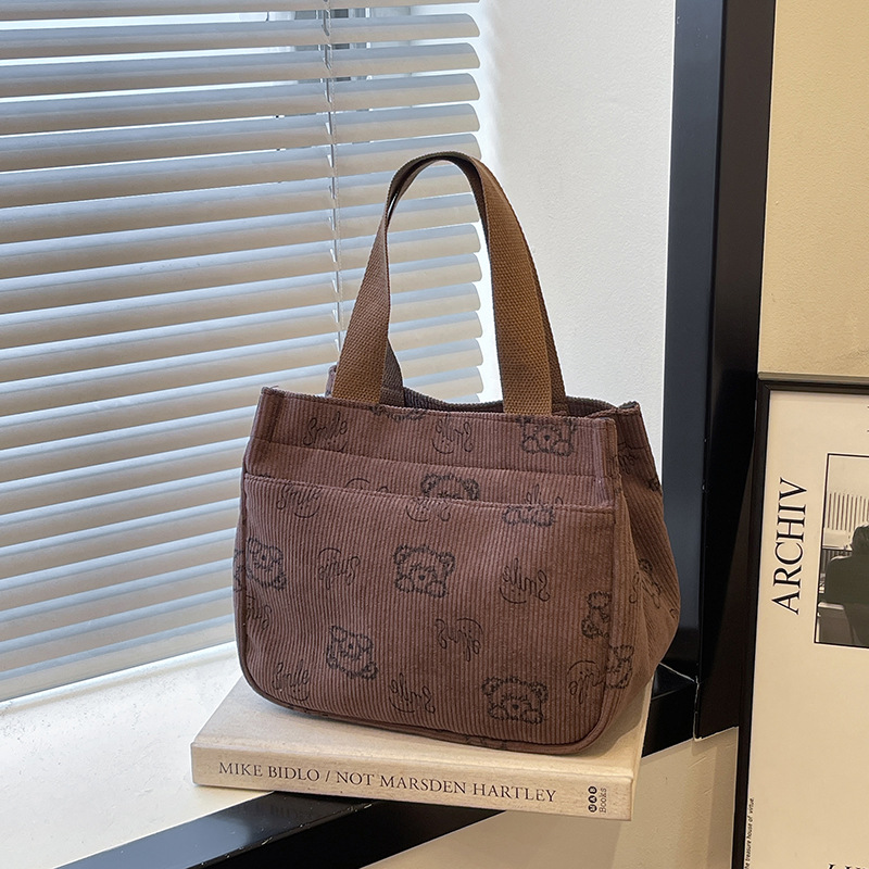 2025 New corduroy bag, multi-pocket outdoor bag, ins retro portable tote bag, student bucket bag full figure