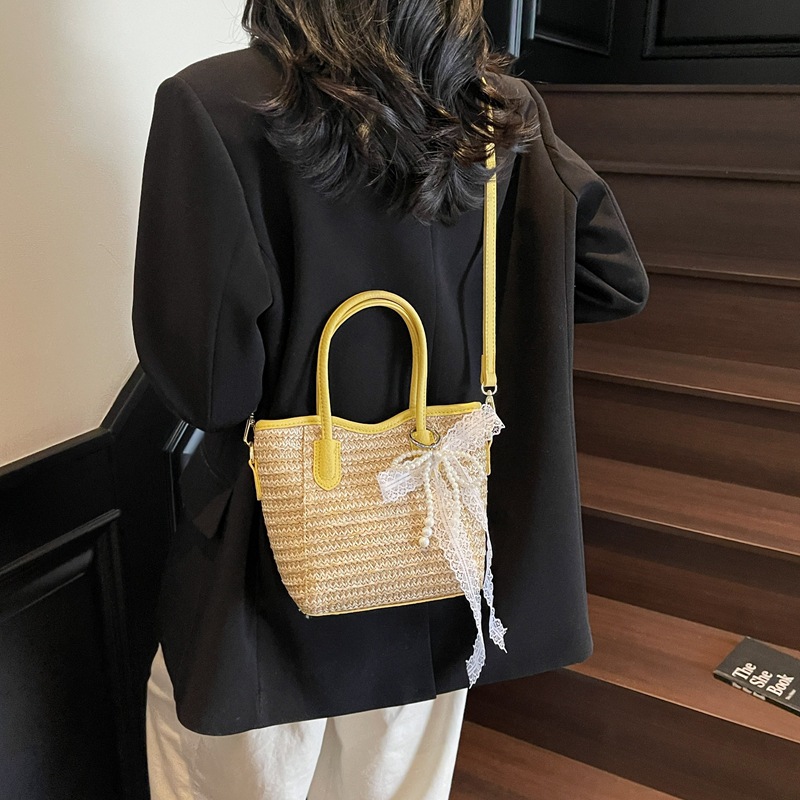 Trendy large-capacity straw-woven hand-held bucket bag for women 2025 New style beach vacation commuting fashion single-shoulder crossbody bag Specification drawing