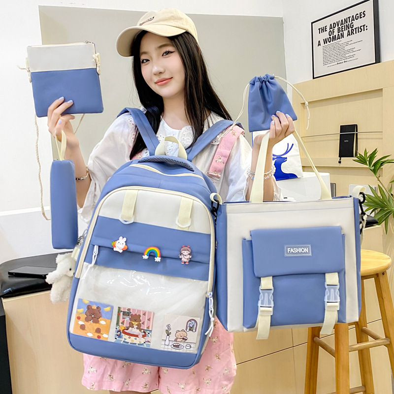 A new large-capacity four-piece schoolbag for girls, a lightweight back-protecting backpack with contrasting colors, and a storage backpack for middle school students details Picture