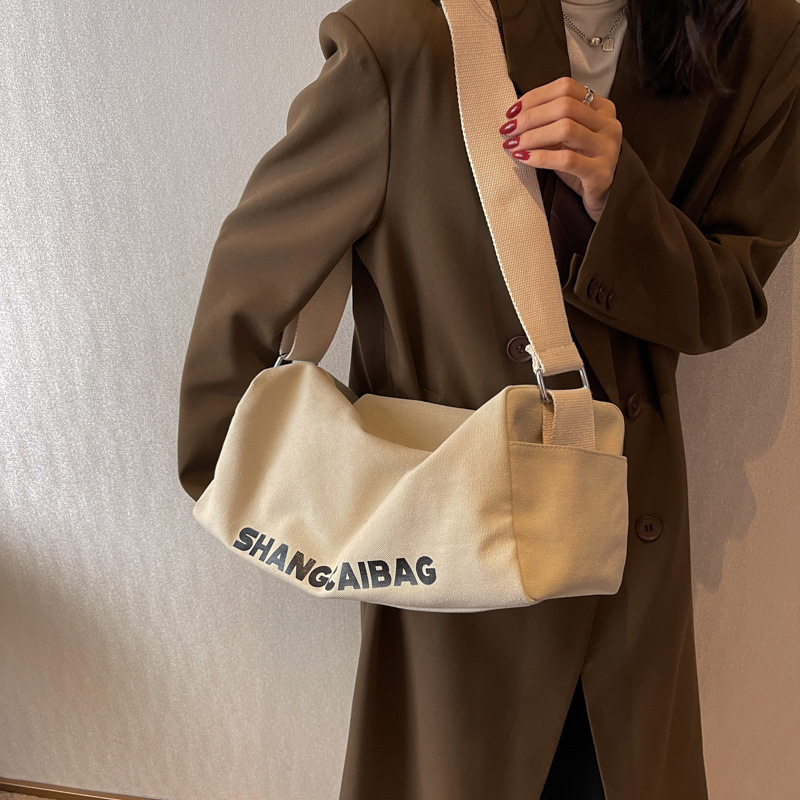 Canvas bag for women, large-capacity casual sports backpack, 2022 autumn and winter new crossbody bag, fashionable single-shoulder bag for women full figure