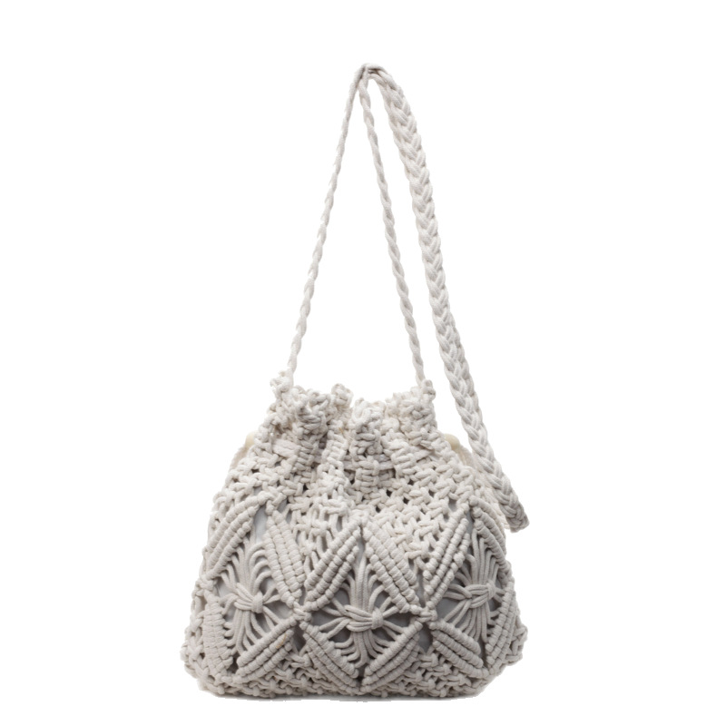 A new summer 2025 fashion and trendy single-shoulder crossbody bag for women, a beach vacation style and beach travel woven bucket bag Item Picture