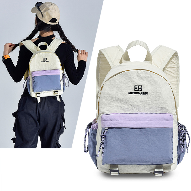 New lightweight outdoor travel backpack for college students, simple small schoolbag, Korean style color contrast, versatile and fresh backpack full figure