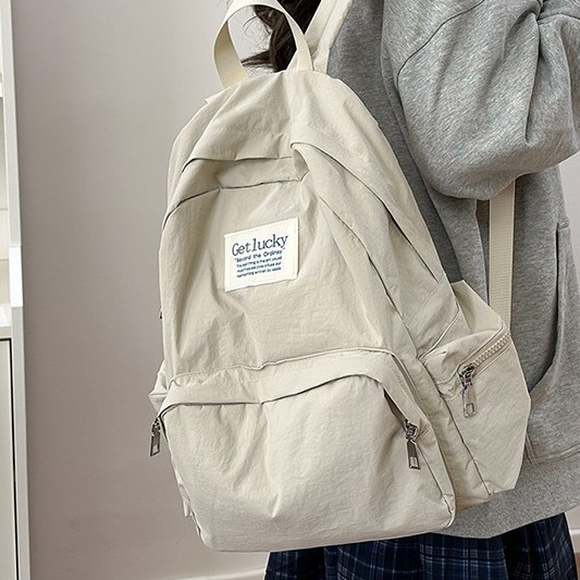 New large-capacity student schoolbag, solid color casual outdoor versatile backpack, water-washed fabric simple school style bag Specification drawing