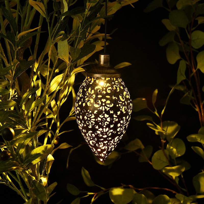 The manufacturer's new ironwork waterproof solar lamp, sensor water drop lamp, outdoor garden and courtyard hollowed-out decorative projection lamp details Picture