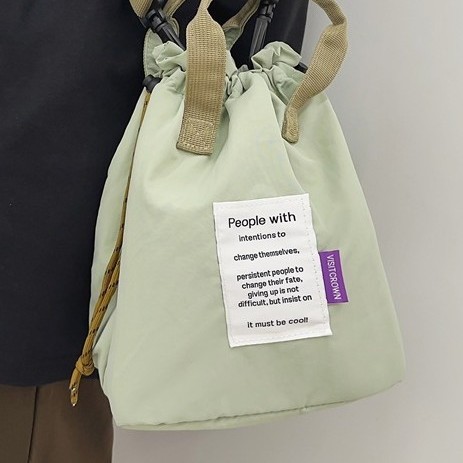 New Japanese drawstring single-shoulder crossbody bag, lightweight and unisex handbag, versatile and color-blocking crossbody bag Application Scenario