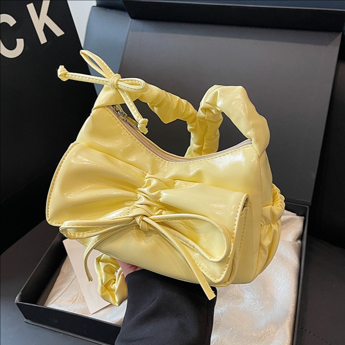 A niche pleated bow underarm bag for women in 2025, a trendy and fashionable single-shoulder bag with a high-end feel and versatile crossbody full figure