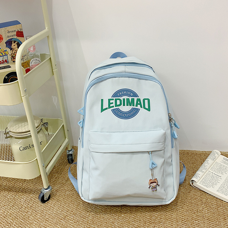 The 2024 new double-shoulder schoolbag, with a fresh and elegant school style, is a simple and versatile Korean-style casual bag for primary and secondary school students full figure