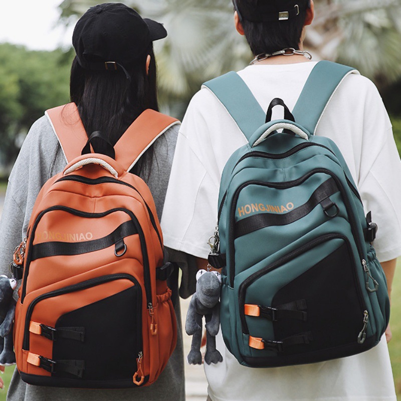 The new super cool backpack features a high level of appearance. It's a large-capacity Korean-style schoolbag for primary and secondary school students with a simple color contrast and a backrest for women full figure