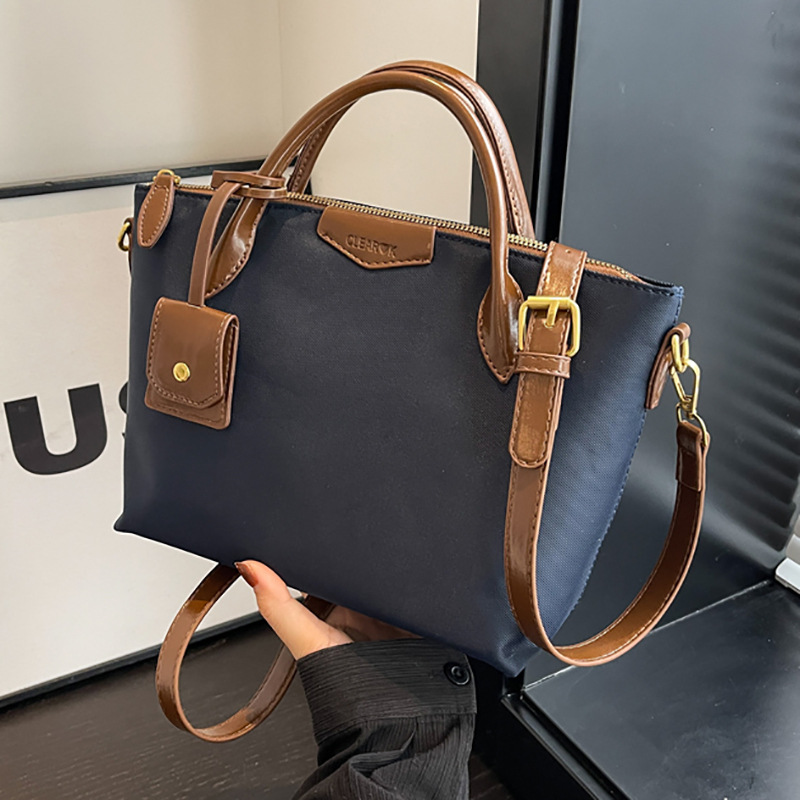 A versatile, fashionable and high-end Oxford fabric large-capacity tote bag for women, a new 2023 solid color commuter crossbody bag full figure