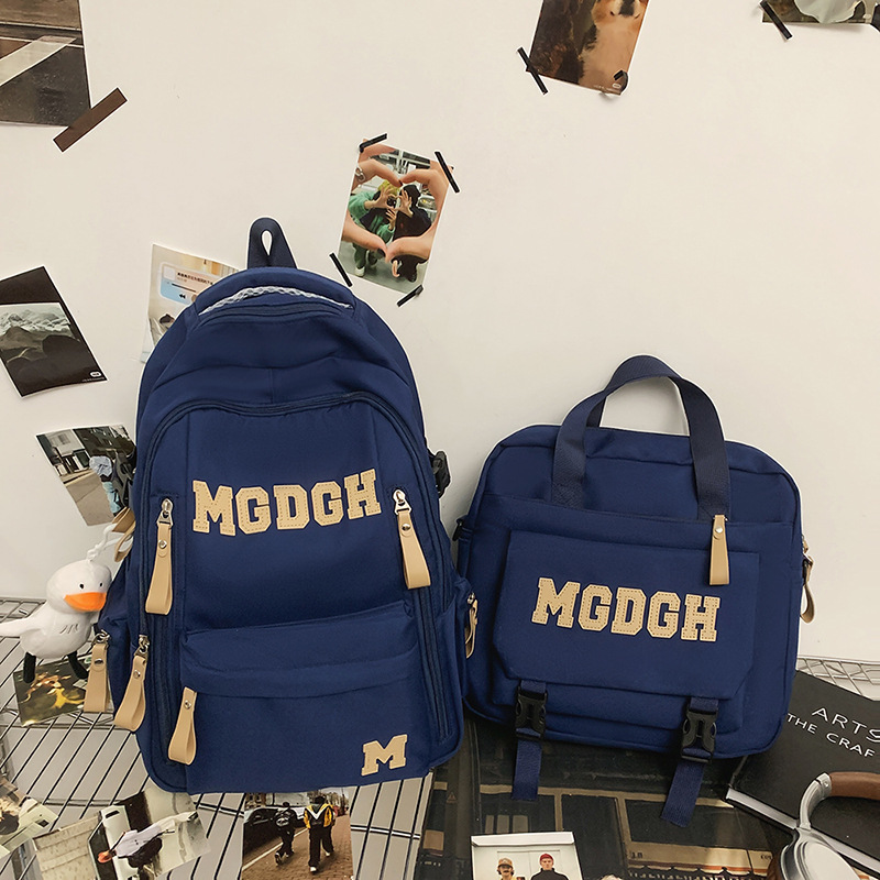 A high-appearation-level two-piece schoolbag set with a large capacity for both men and women, a simple letter and trendy backpack for both students Application Scenario