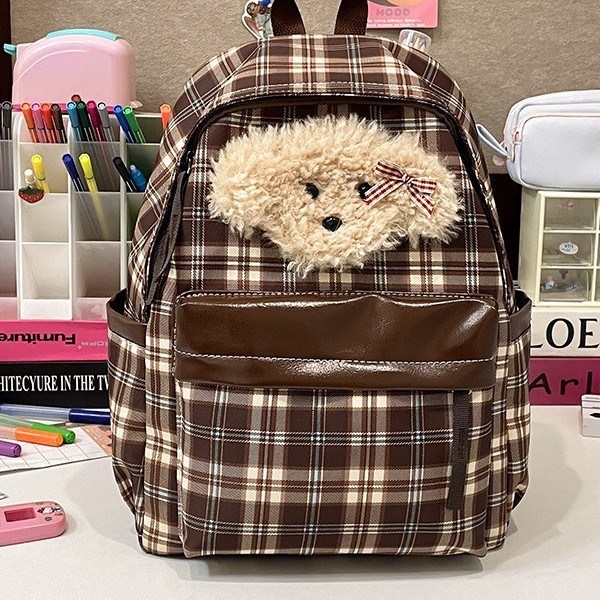 The new cute puppy backpack features a large capacity with a fashionable checkered pattern, a school-style and adorable backpack for young girls, and a student schoolbag Application Scenario