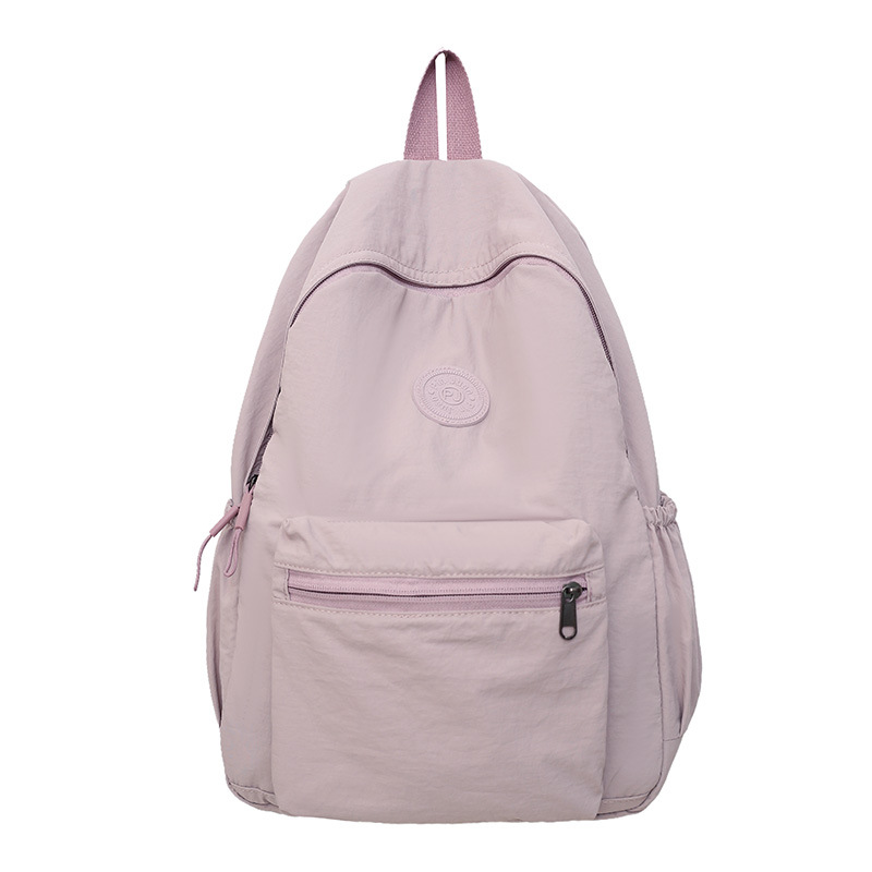 New simple and casual backpack in Korean solid color, versatile and fashionable backpack, and school bag for junior high school, senior high school and college students Item Picture