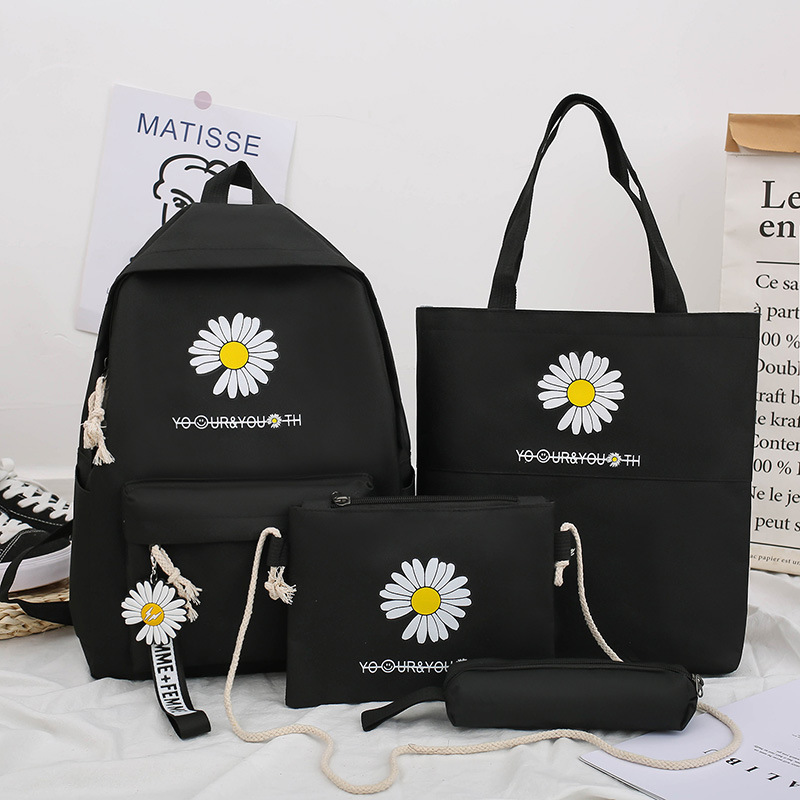 A Korean-style trendy travel bag with LOGO printing, a casual schoolbag for girls, and a simple and fashionable four-piece computer set full figure