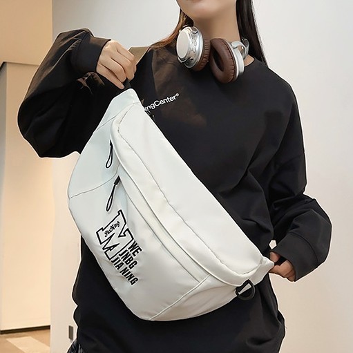 A new portable student crossbody bag with a large capacity, suitable for both boys and girls, featuring an outdoor sporty and laid-back style full figure