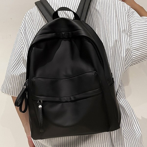 A simple and new Korean-style solid-color high school backpack that is casual and versatile, a simple and fashionable college backpack, and a junior high school backpack details Picture