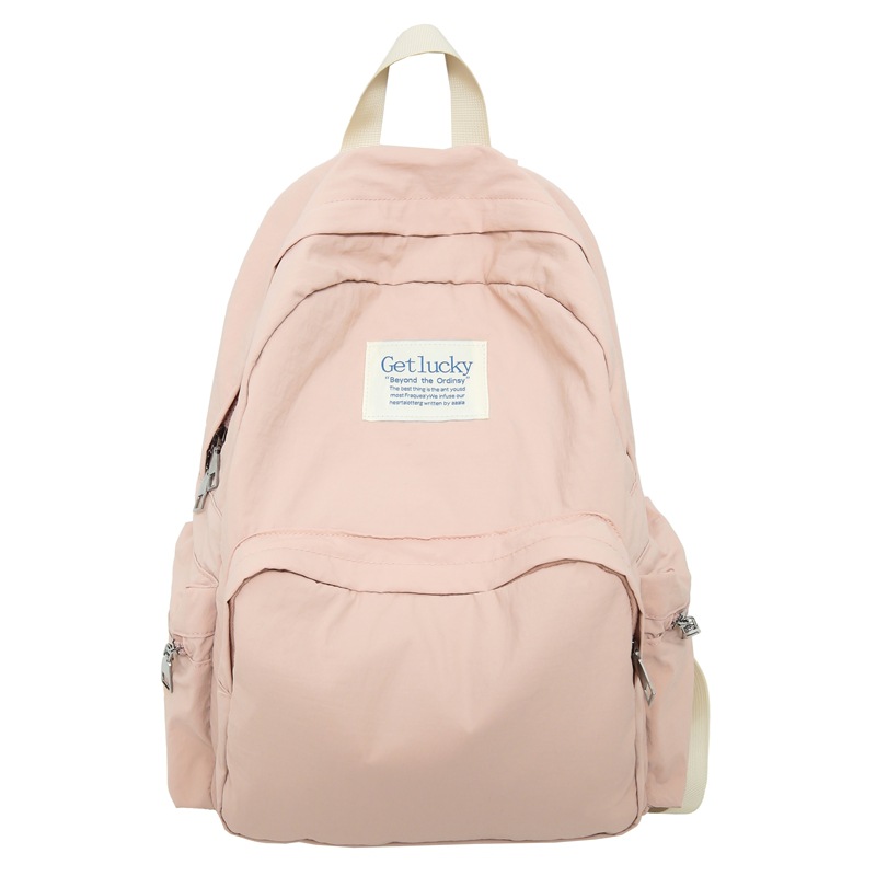 New large-capacity student schoolbag, solid color casual outdoor versatile backpack, water-washed fabric simple school style bag Item Picture