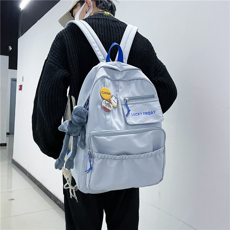 A new style of college student backpack, a simple Korean high school backpack for men, a large-capacity multi-bag backpack for women, and a backpack for junior high school boys details Picture