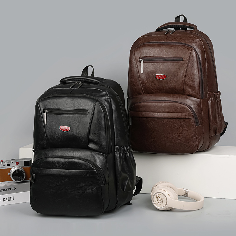 The manufacturer wholesals new men's and women's casual bags, large-capacity travel backpacks, Korean-style backpacks and college students' casual schoolbags full figure