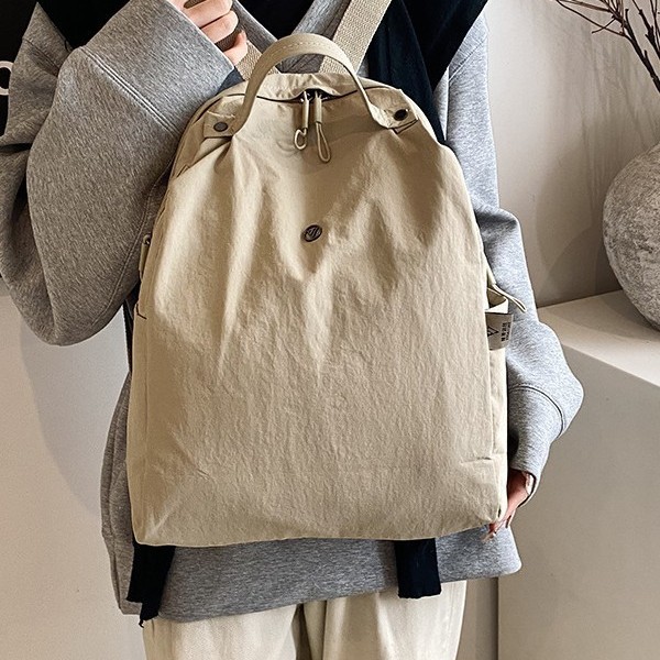 Fashionable new solid-color backpack, large-capacity casual and versatile, hand-held student bag, outdoor laid-back style backpack details Picture