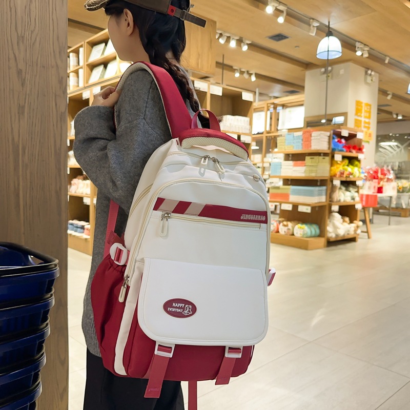 Manufacturer's in-stock large-capacity junior high school student schoolbags, girls' high school appearance level versatile casual backpacks, weight-reducing and spine-protecting backpacks details Picture