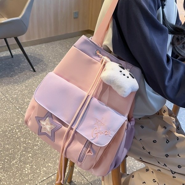 The new cute color-blocking student single-shoulder bag, a multi-functional backpack with a girlish style, features a casual design and a large capacity full figure