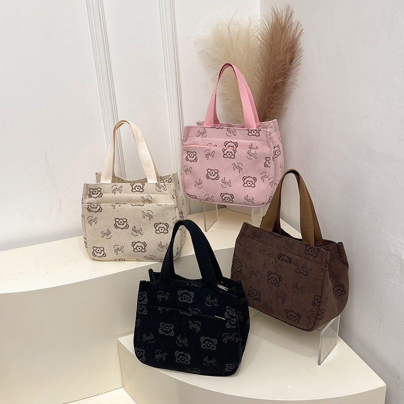 2025 New corduroy bag, multi-pocket outdoor bag, ins retro portable tote bag, student bucket bag Application Scenario