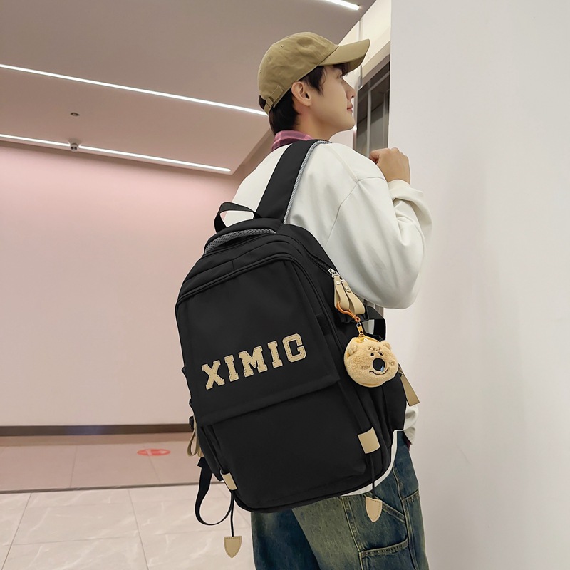 The new schoolbag is a trendy and cool casual backpack for middle school girls, a couple's backpack for college students, and a two-piece set for primary school students Specification drawing