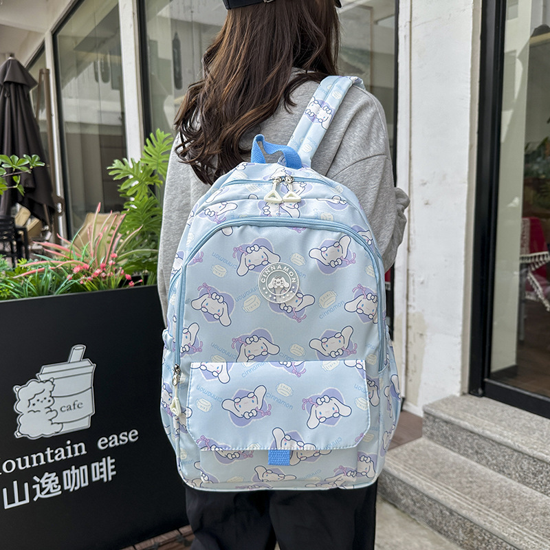 New cartoon graffiti backpack for girls, a large-capacity backpack for junior and senior high school students, a fresh and cute student bag Application Scenario