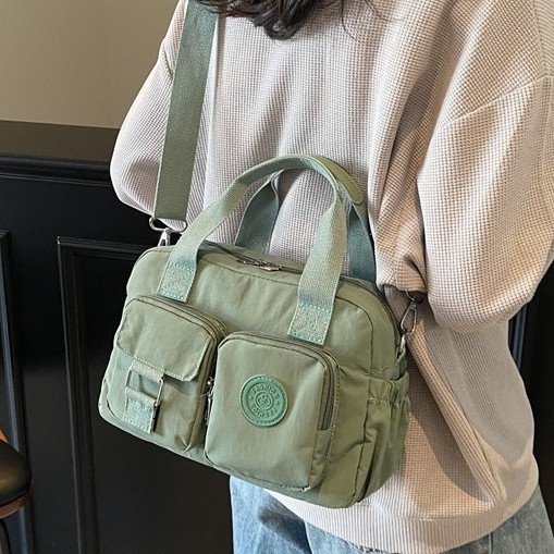 New fashionable multi-pocket women's bag, water-resistant nylon fabric bag, large-capacity hand-carry and one-shoulder crossbody bag for women going out Application Scenario