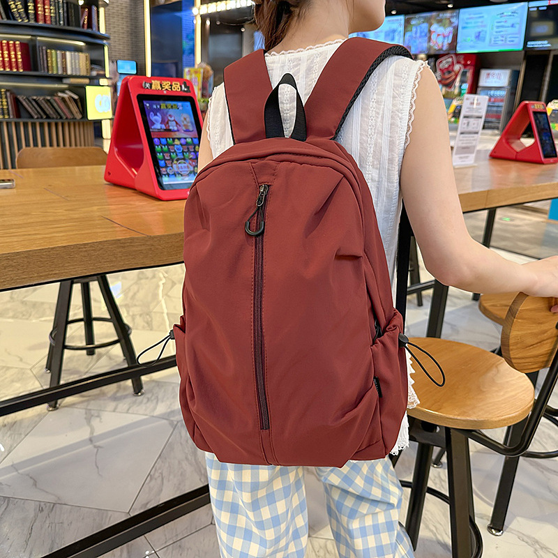 The new Korean-style casual backpack is simple, lightweight, lightweight, water-resistant, and has a large capacity for high school and college students Specification drawing