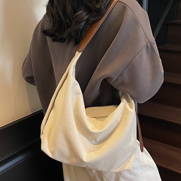 A new solid-color design bag for women, a popular solid-color single-shoulder crossbody bag, a casual large-capacity commuter tote bag Specification drawing